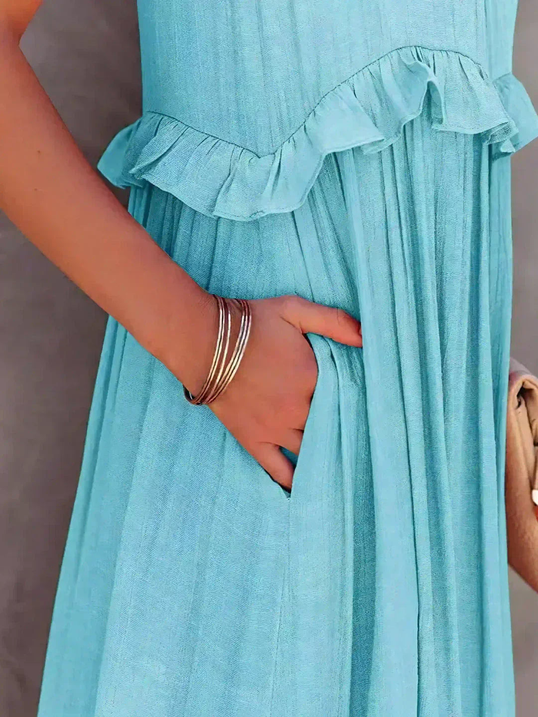 Anita - Elegante vestido sin mangas con volantes